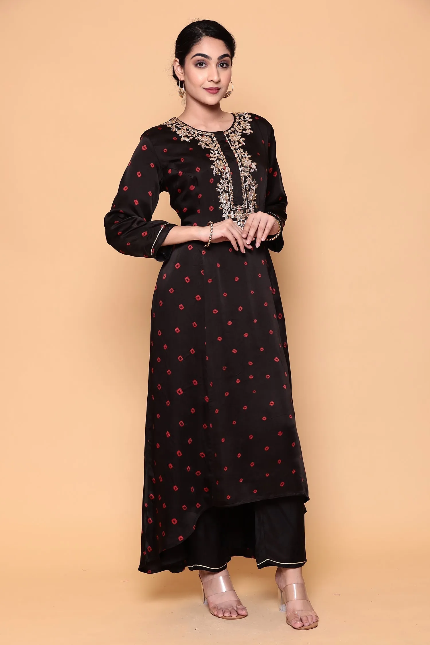 Asymmetric Bandhej Silk Suit with Gota work.