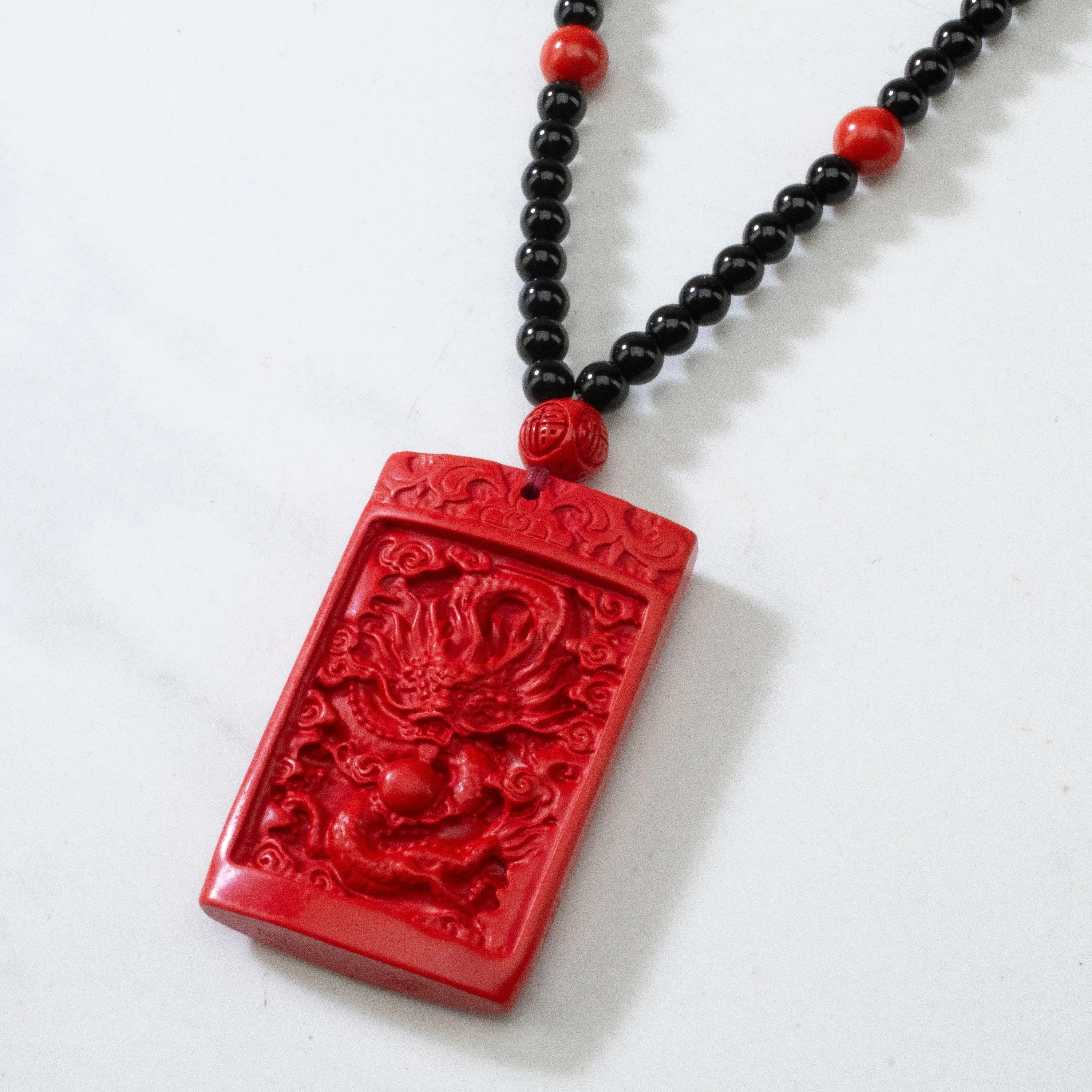 Cinnabar Dragon Carving Necklace